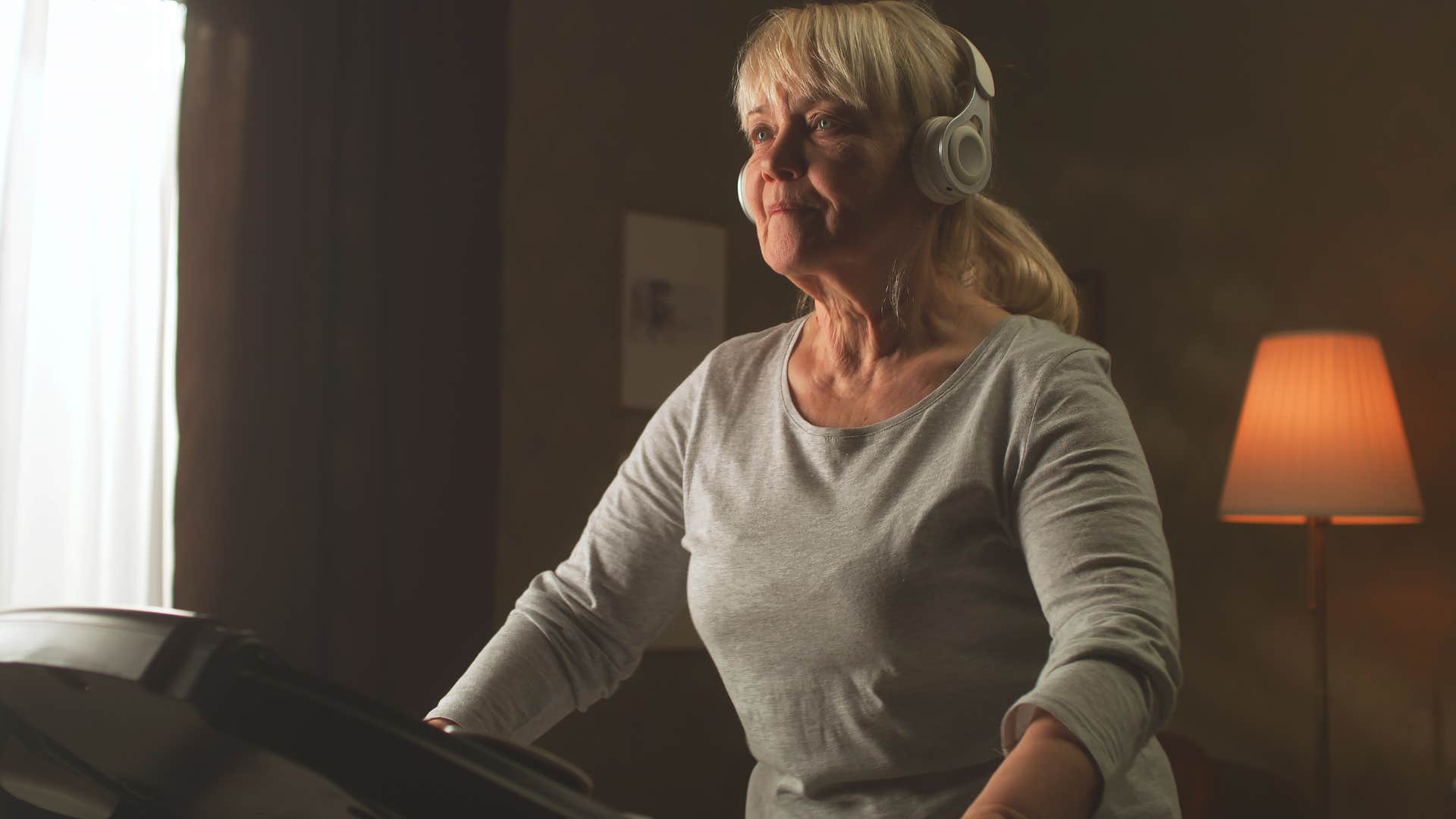 woman using home workout equipment
