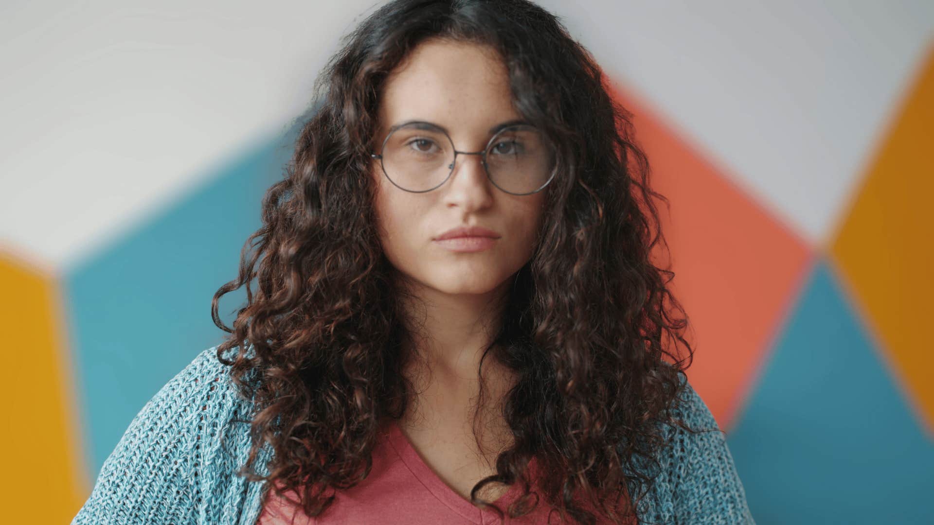 serious young woman not seeing clearly