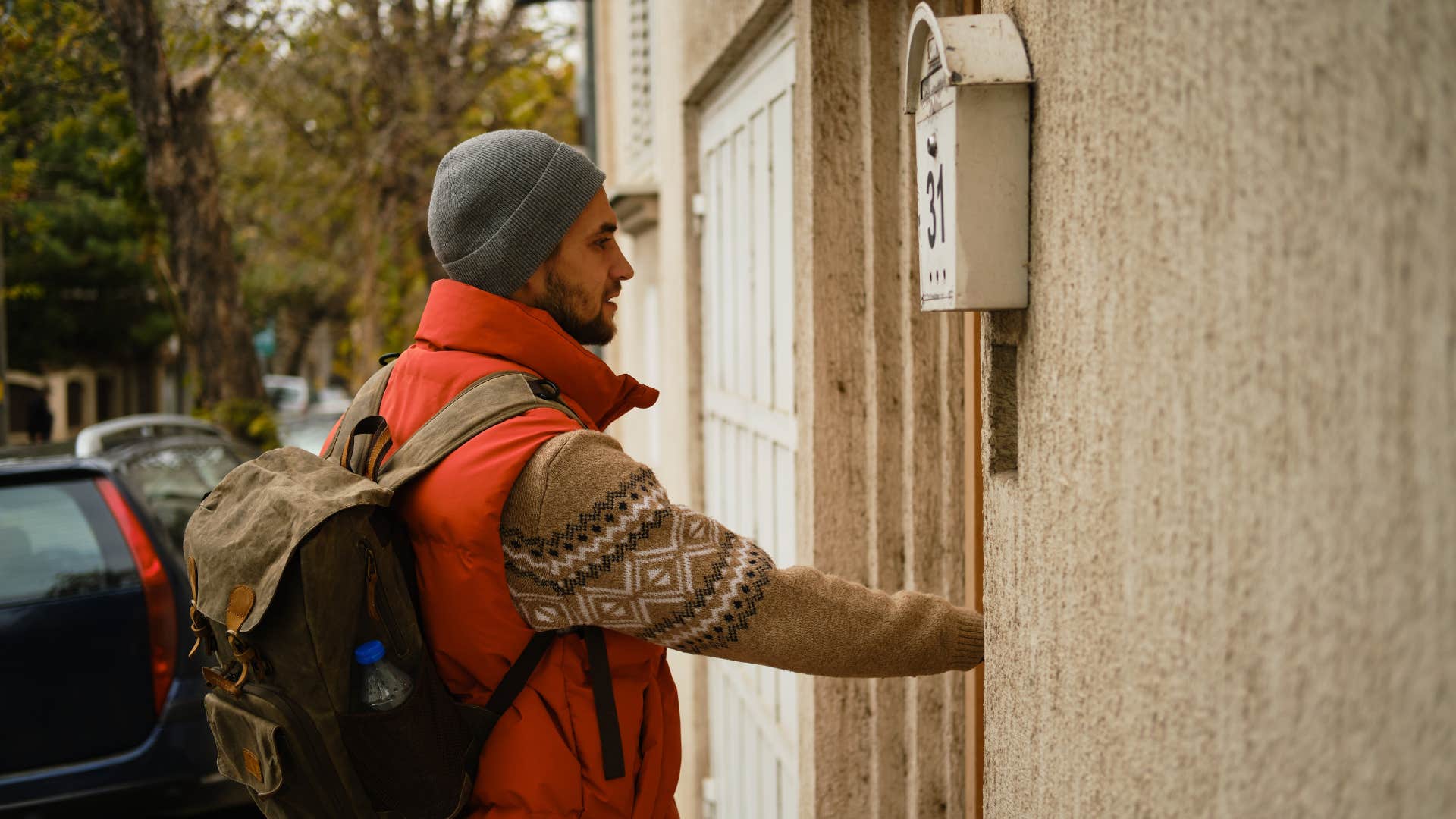 man knocking on door instead of ringing doorbell