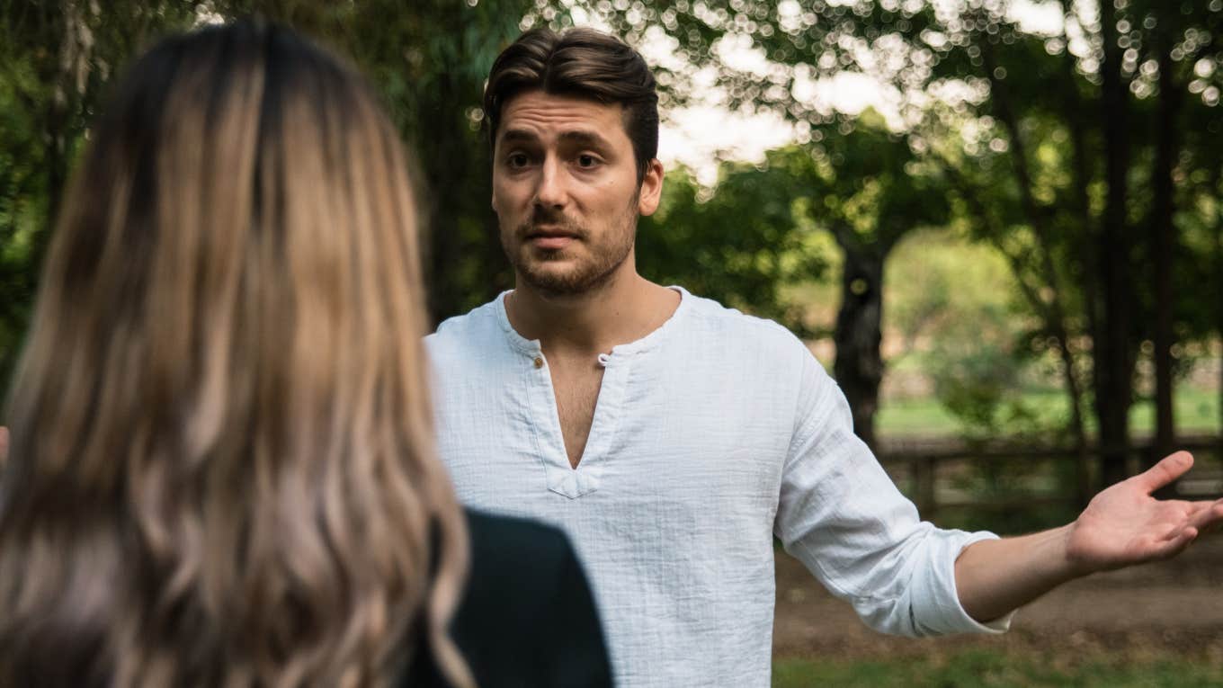 jealous controlling man yelling and angry at partner