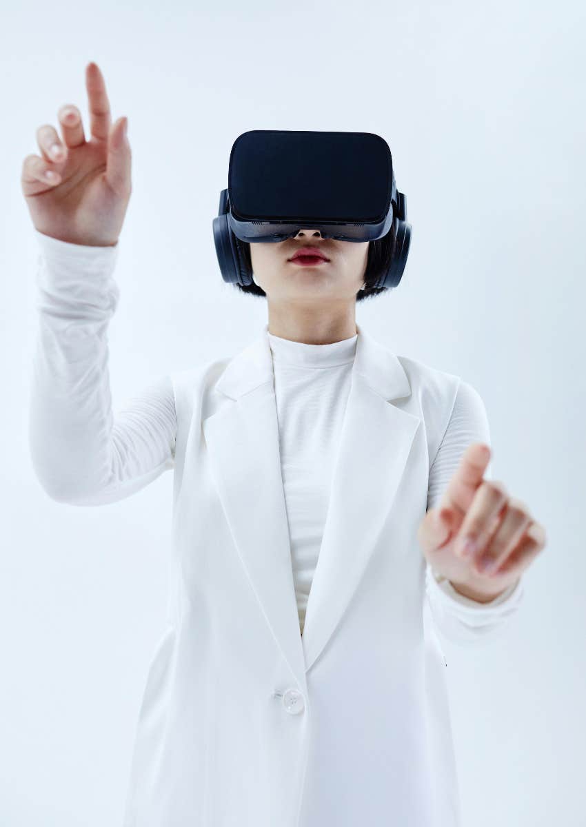 woman using AI through virtual reality glasses