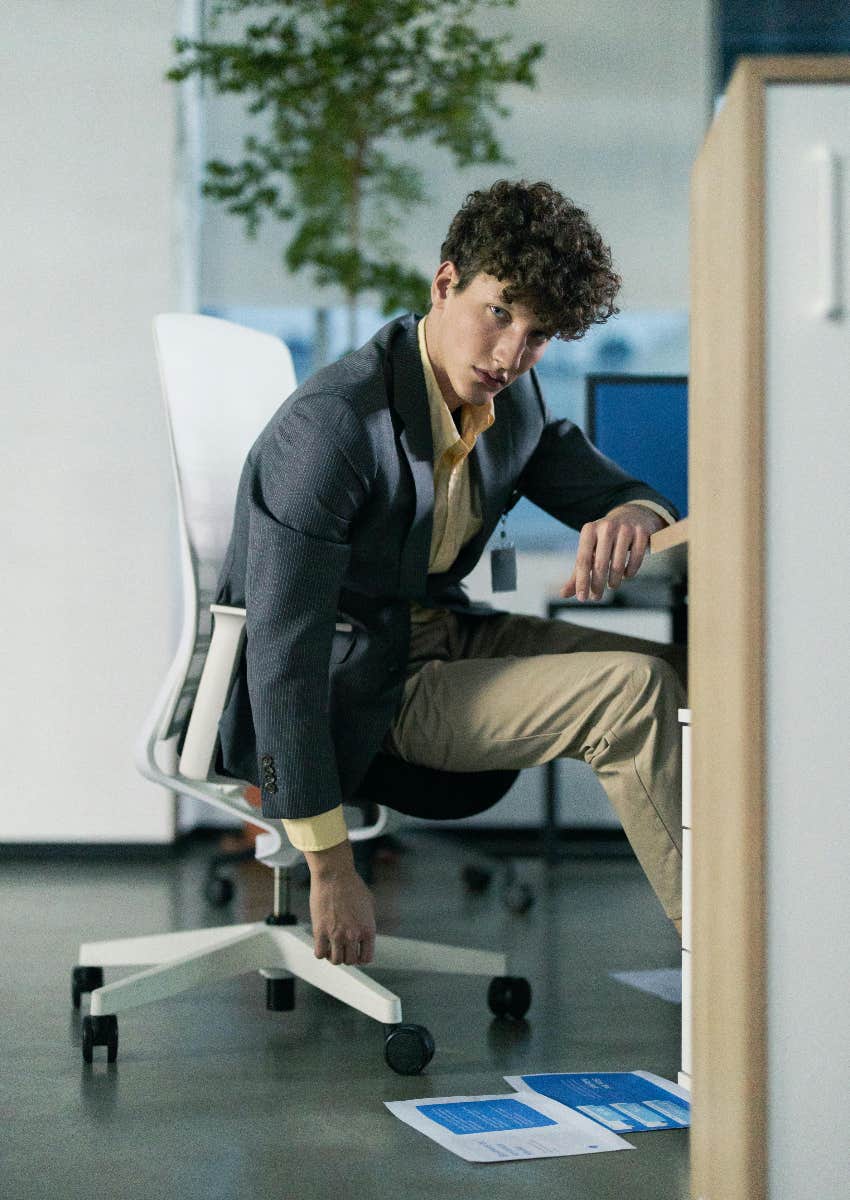 man who is overwhelmed at work