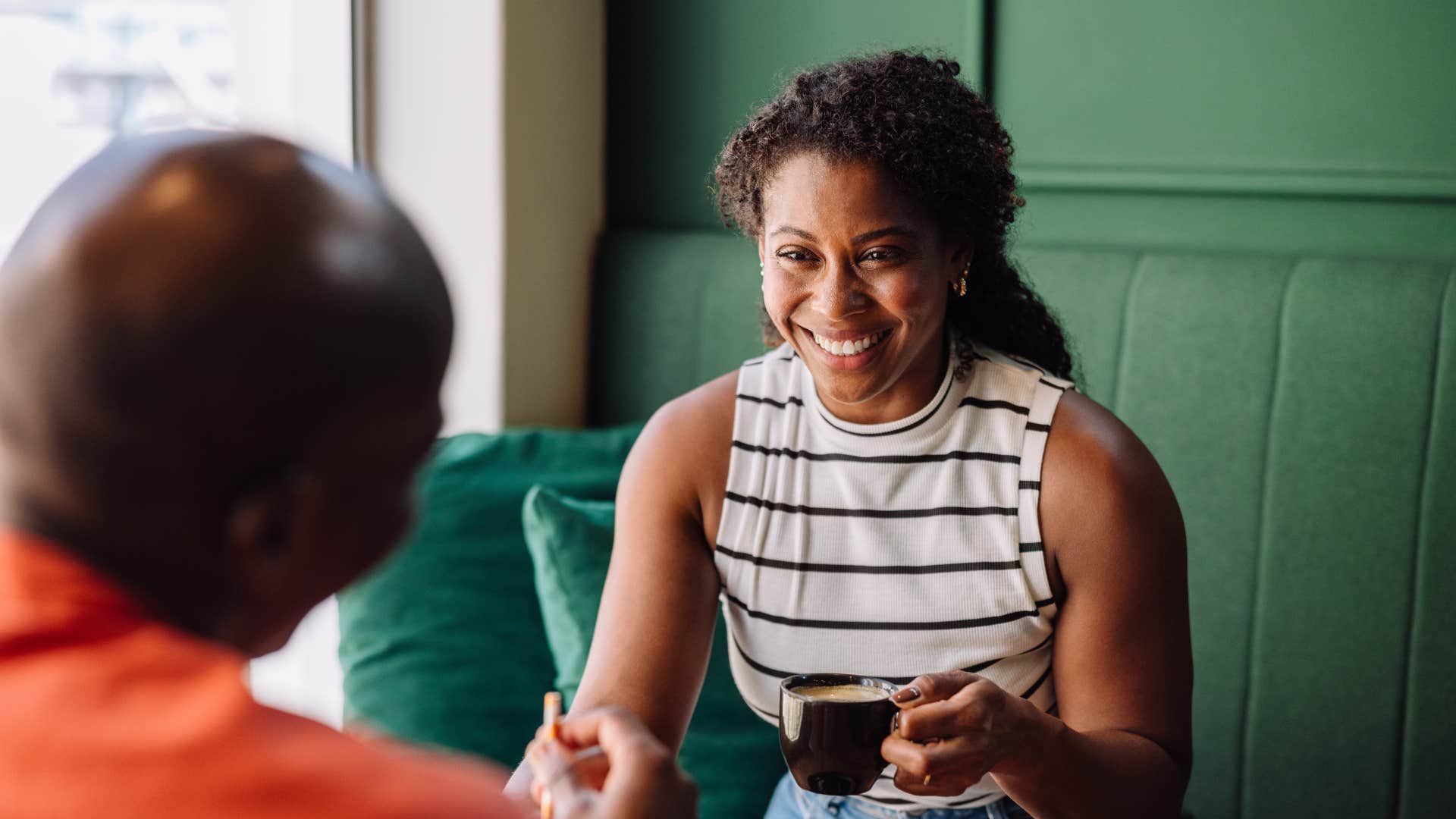 wealthy woman flexing her success to man