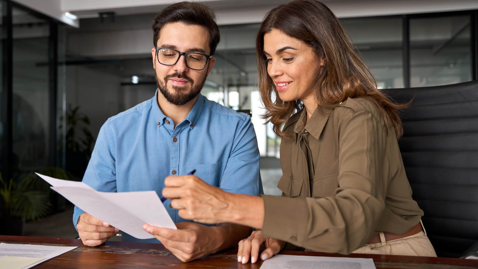 woman saying let's simplify this in a work meeting with colleague