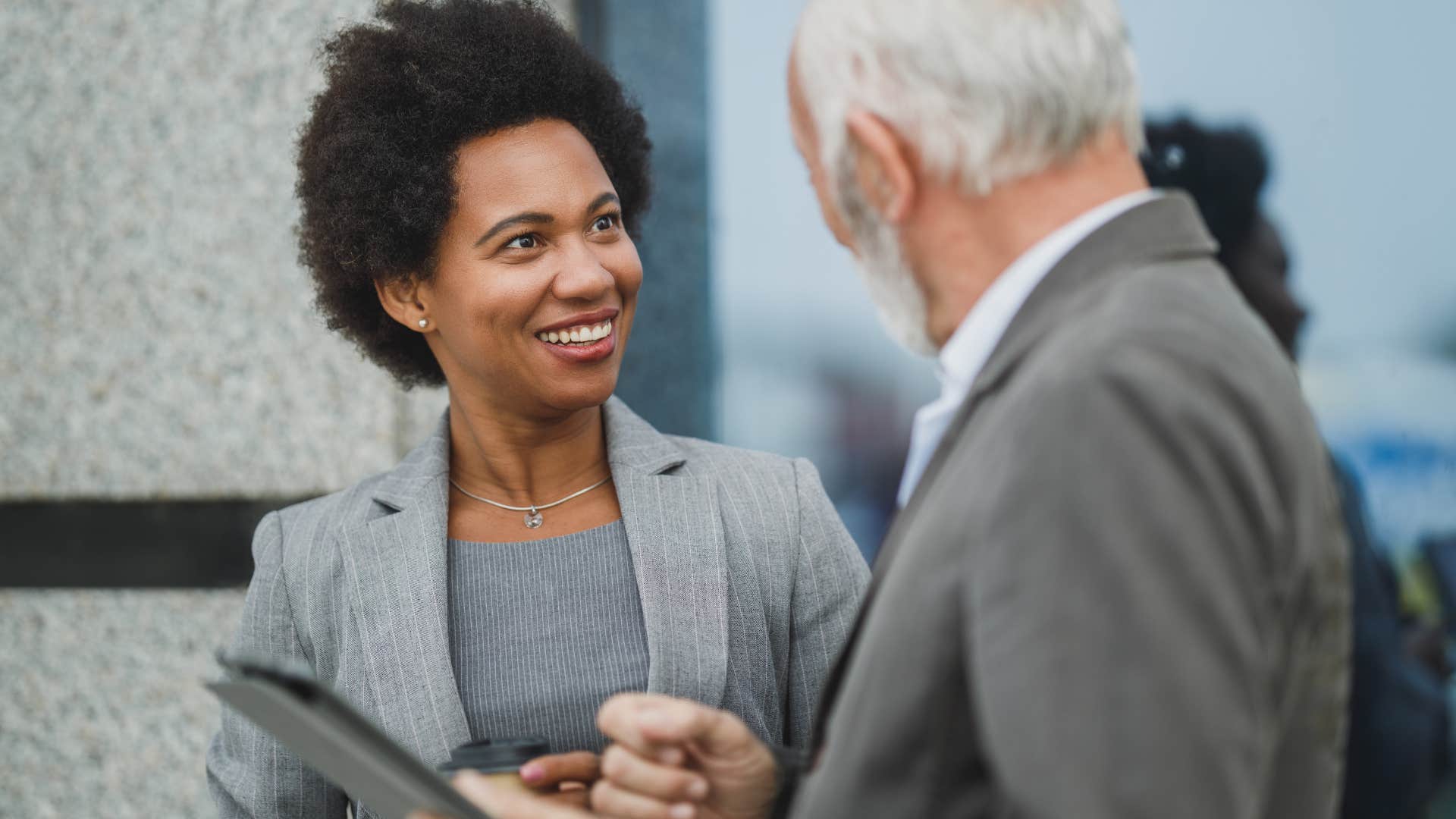 woman saying that's a good idea to a work colleague