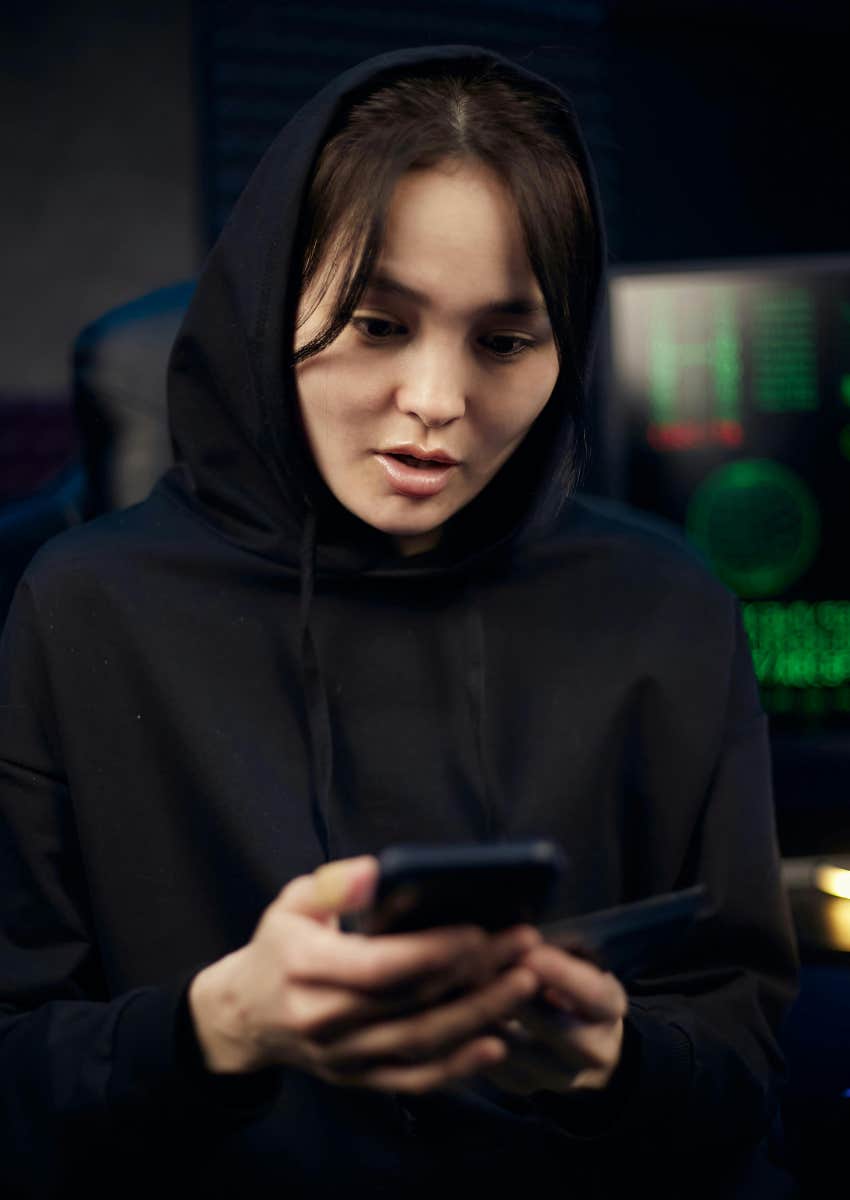 woman looking at her phone because she needs an app for everything