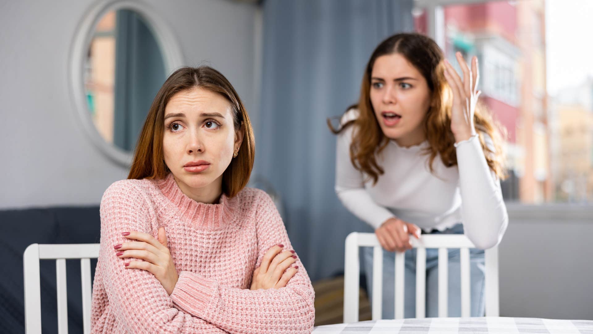 woman who is a bad person in friendship as she blames other woman