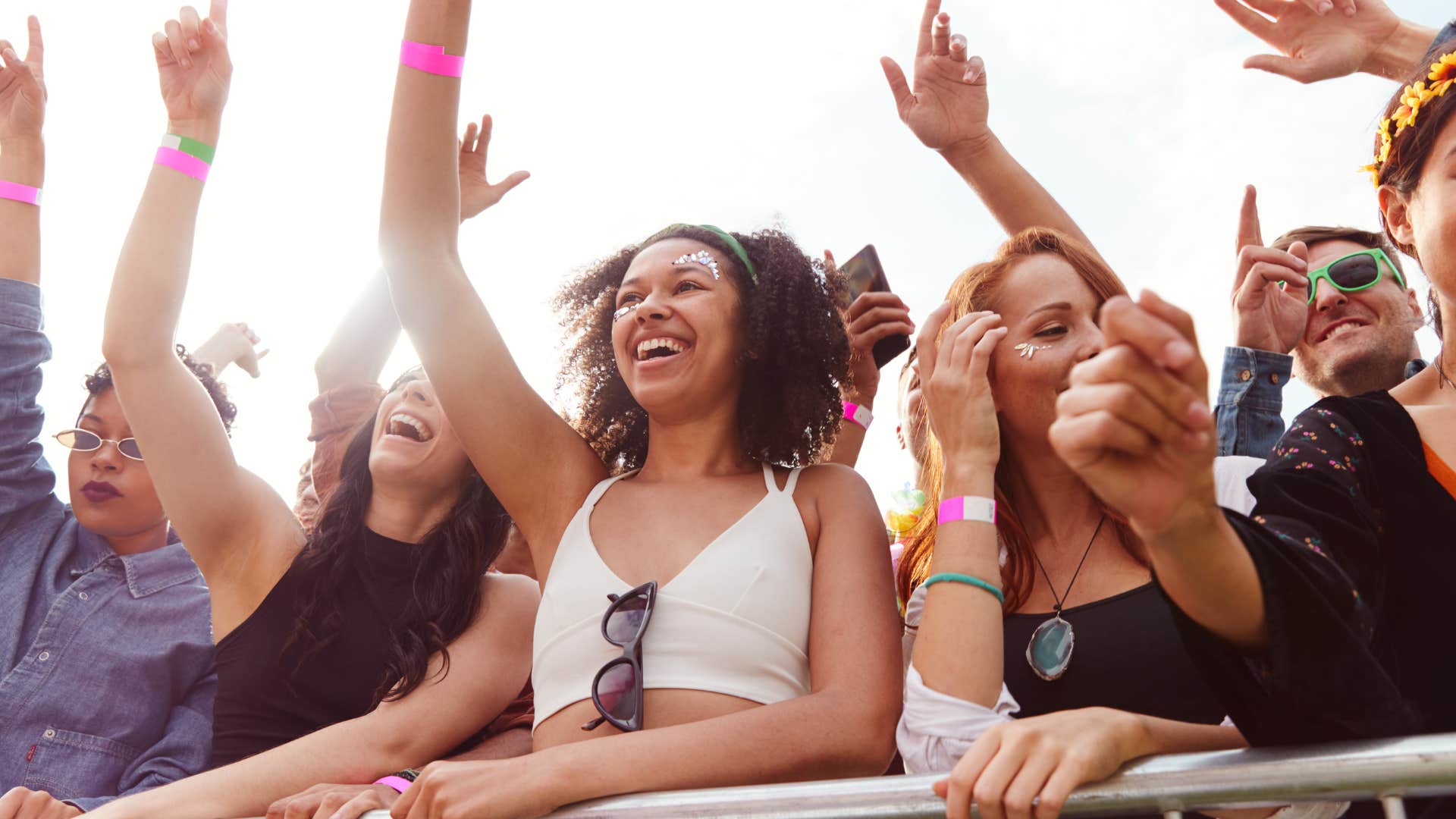 group of people front row at concert