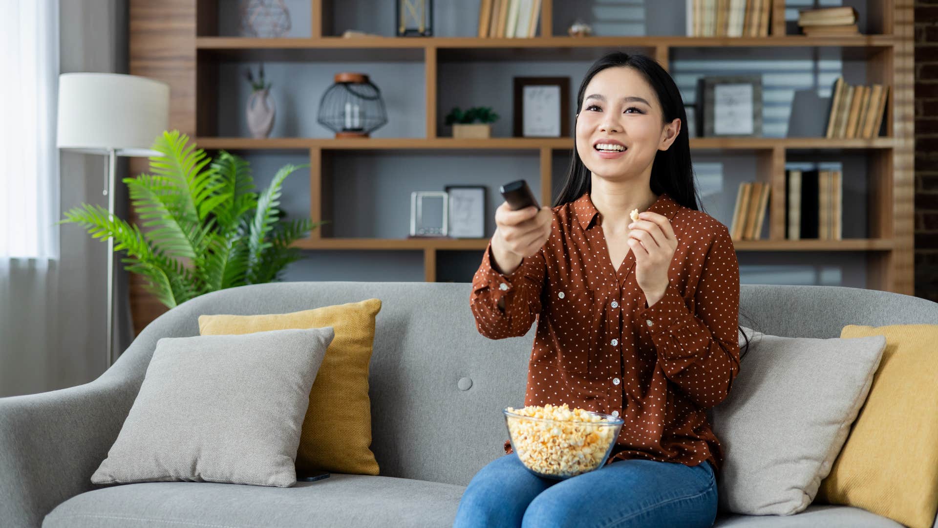 woman watching streaming services with no ads