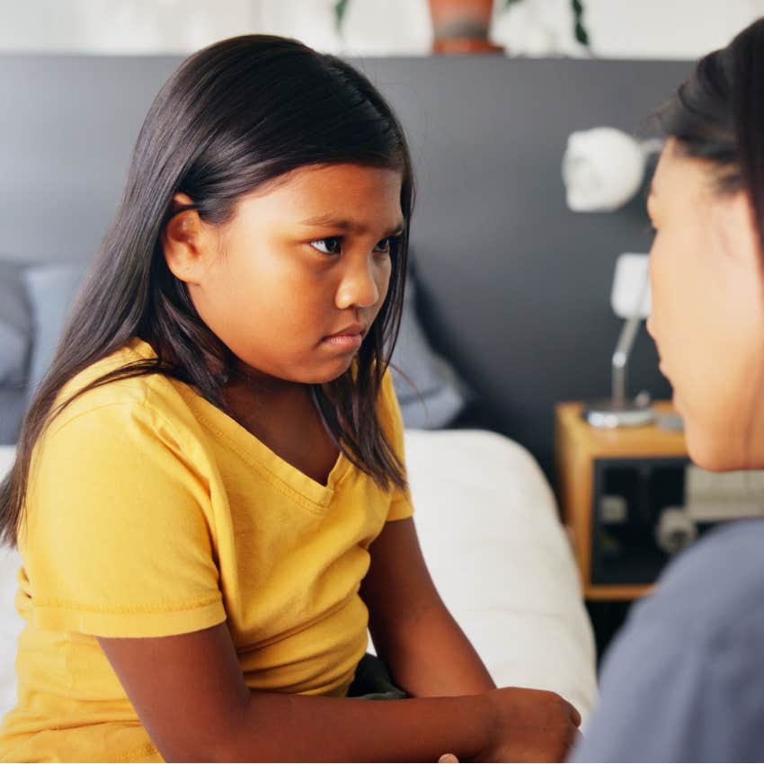little girl learning lessons from consequences from her mother