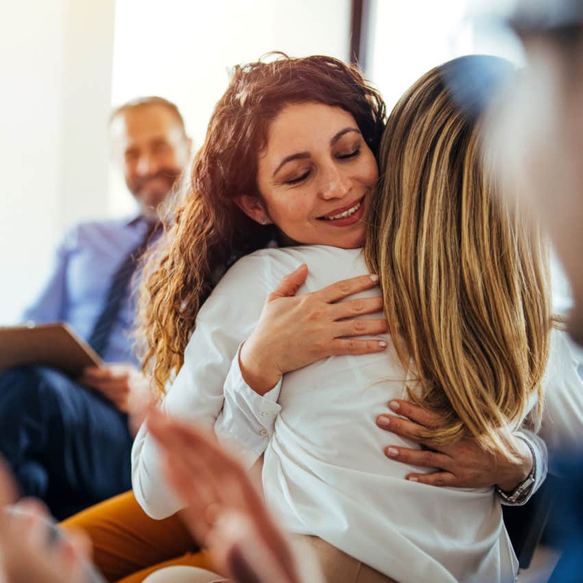woman who is mentally strong as she has compassion for someone else