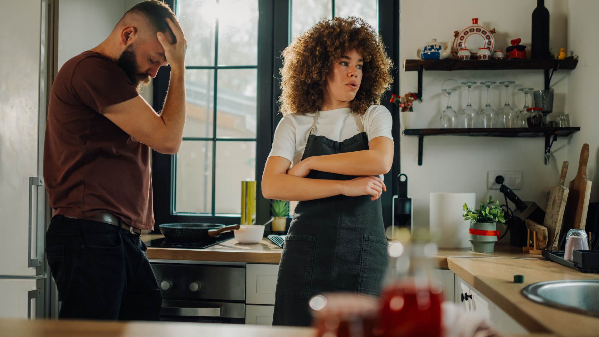 narcissistic man arguing with girlfriend cooking holiday meal