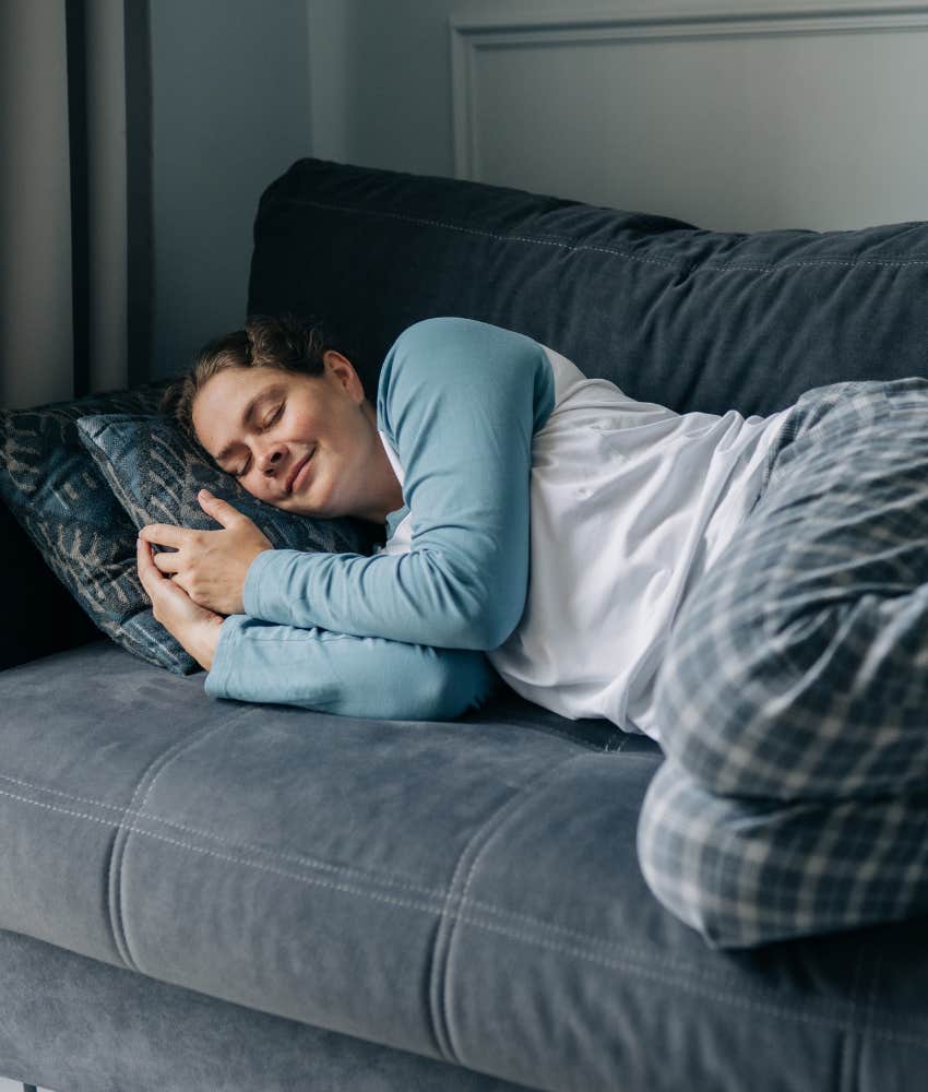 Relaxed woman sleeps on sofa showing things moms do