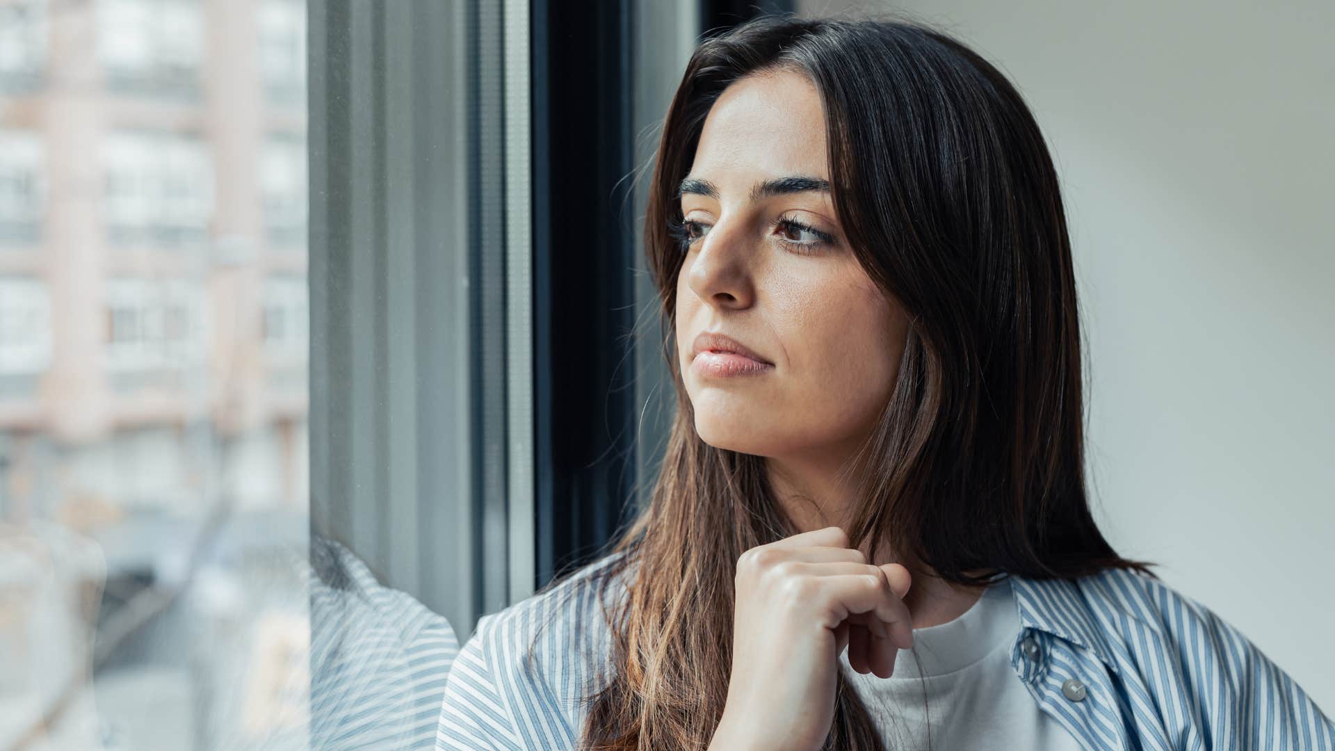 woman thinking hard about how her words affect others