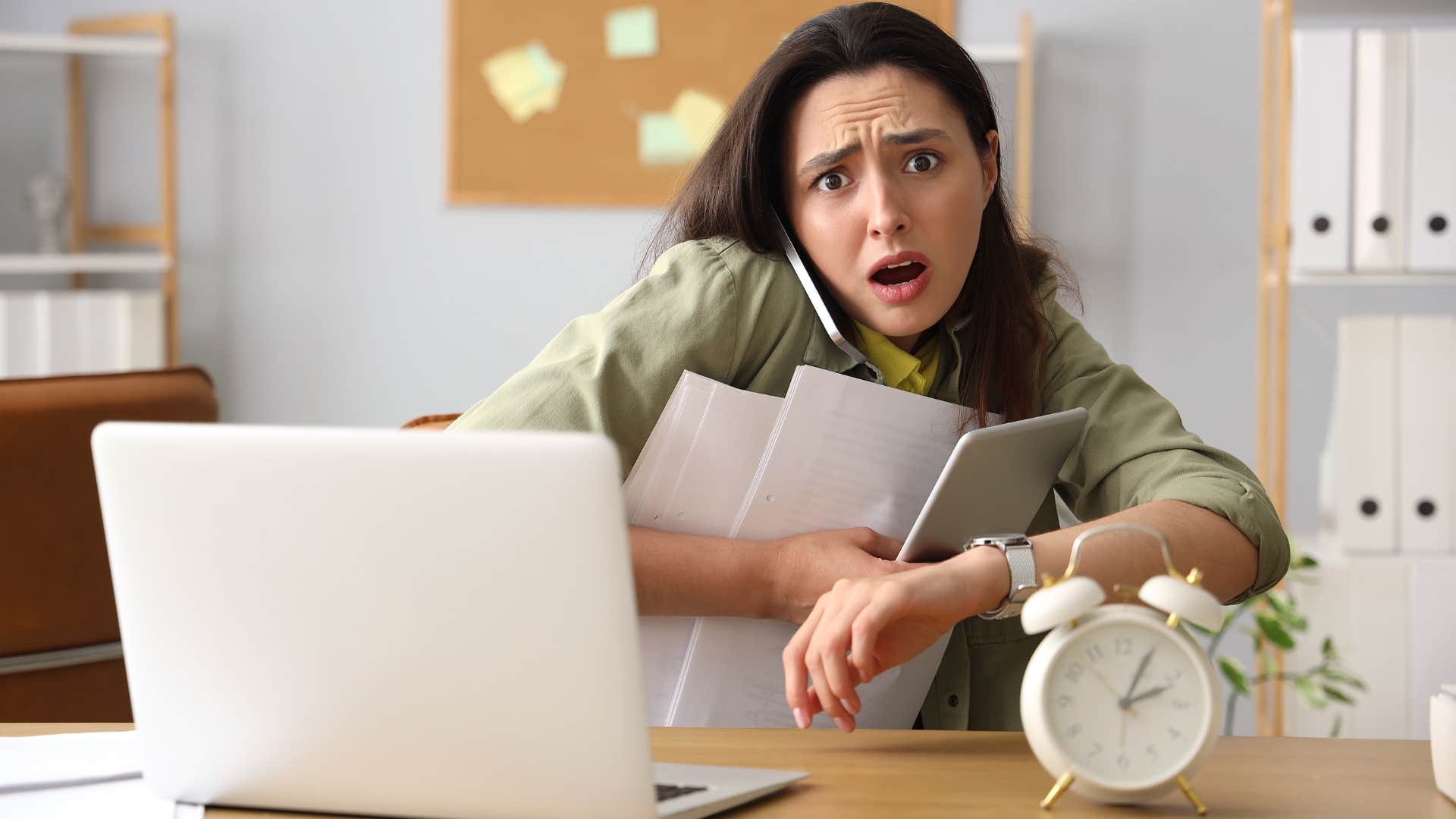stressed rushed woman thinking worst-case scenario at work