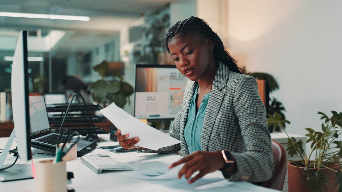 businesswoman working at desk in office