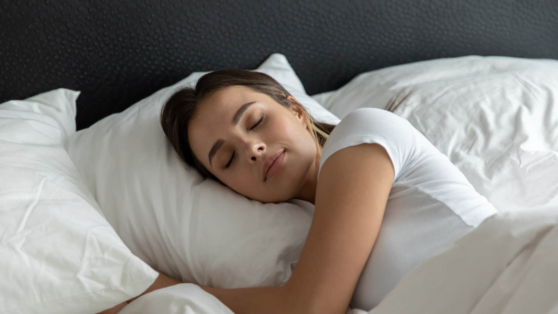 woman sleeping maintaining good sleep hygiene