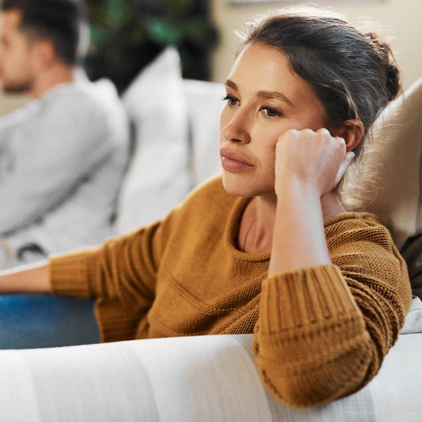 Woman turned away from a disagreement in her home.