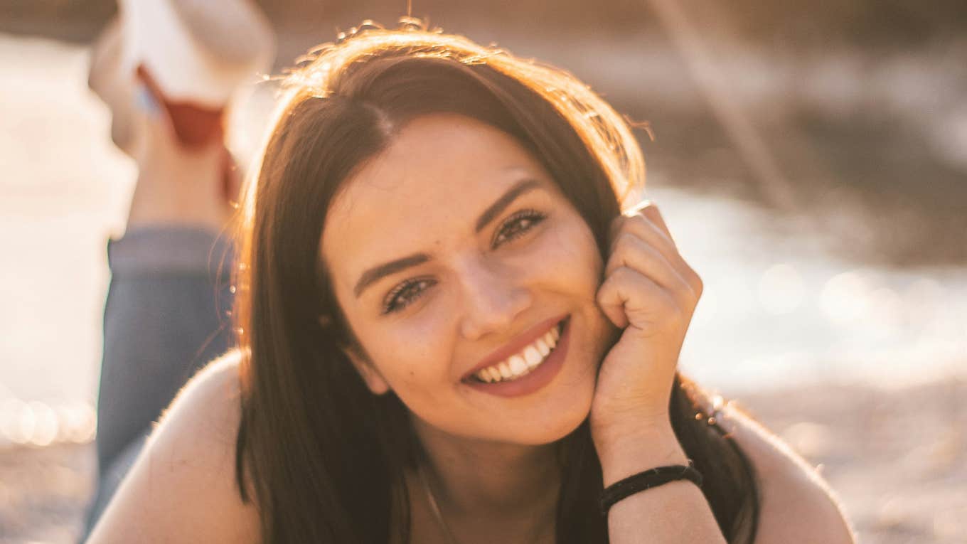 Woman is unbothered and happy.