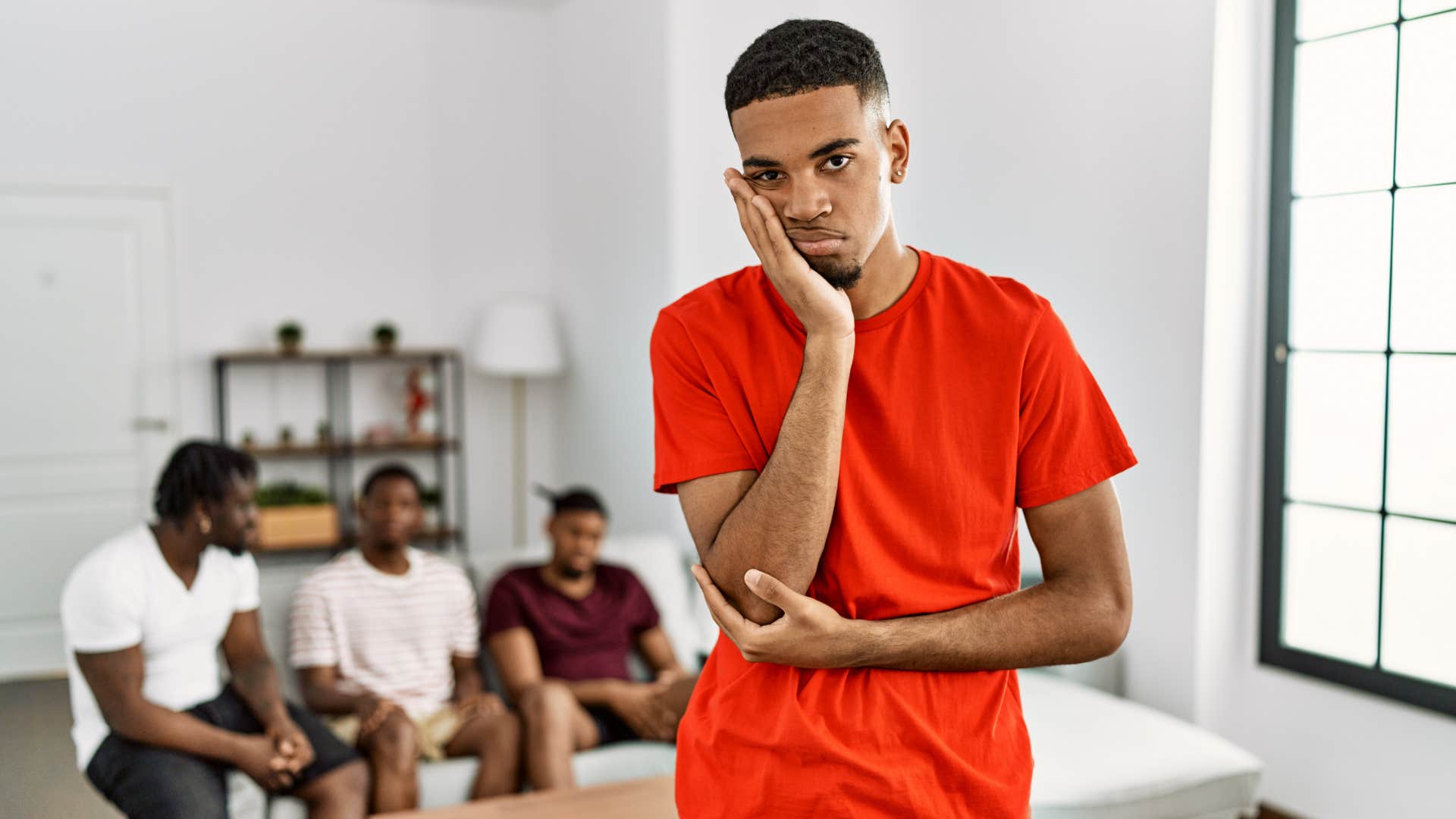 helpful man feeling distant from irresponsible friends