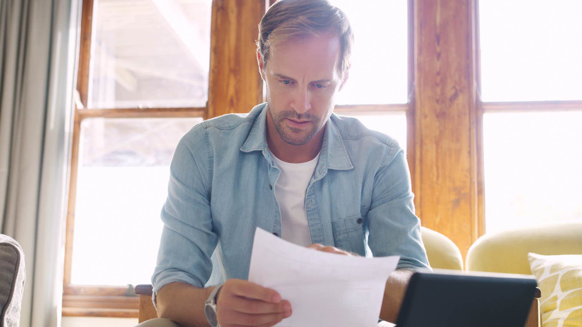 unhappy man putting work first 