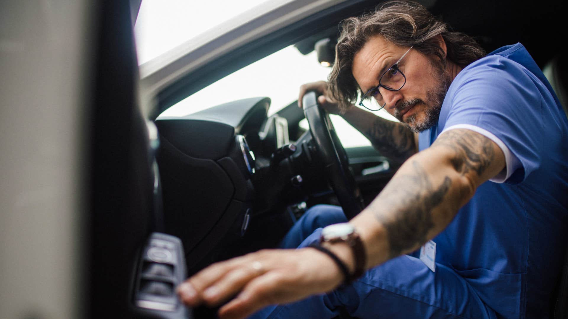 hungry man driving to work after skipping breakfast