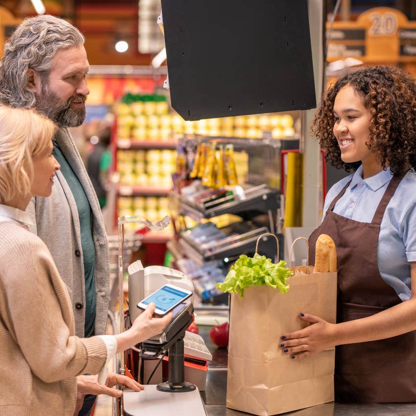 woman who follows the unspoken rule of treating the cashier with respect