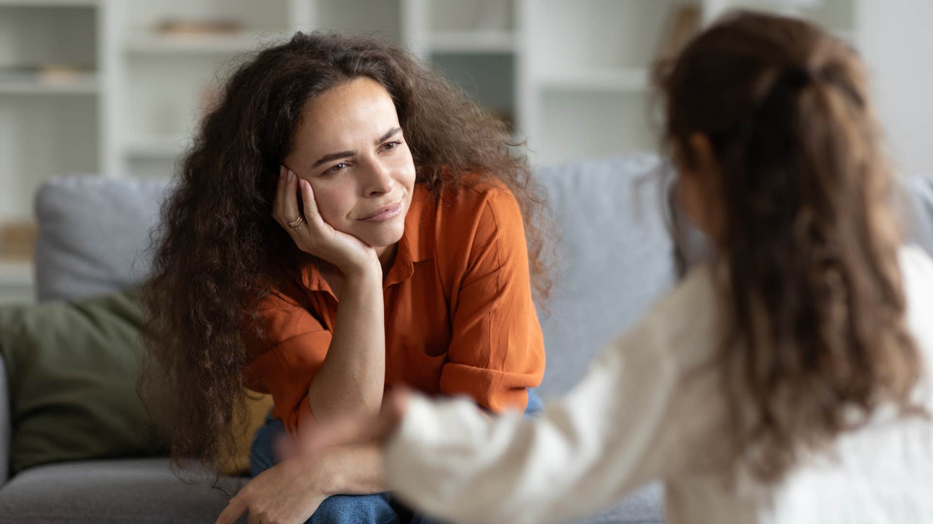 mom engaging in excessive negotiation with child in white shirt