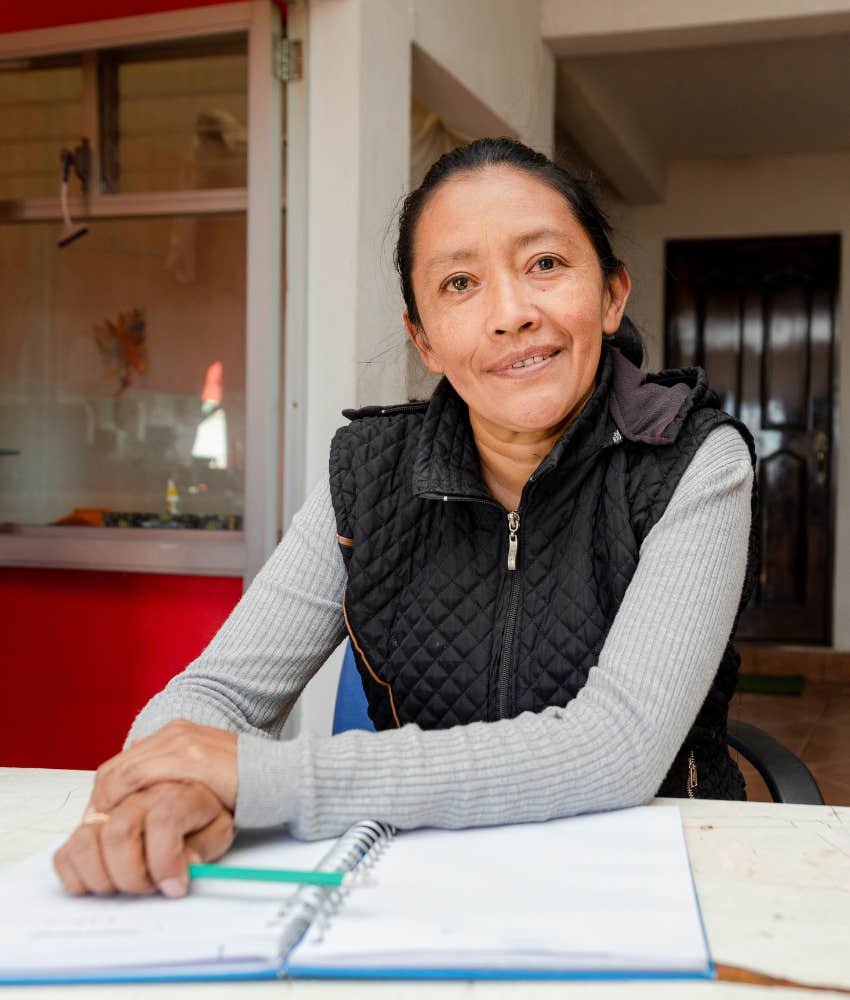 Happy person works from home showing way to rebuild meaning