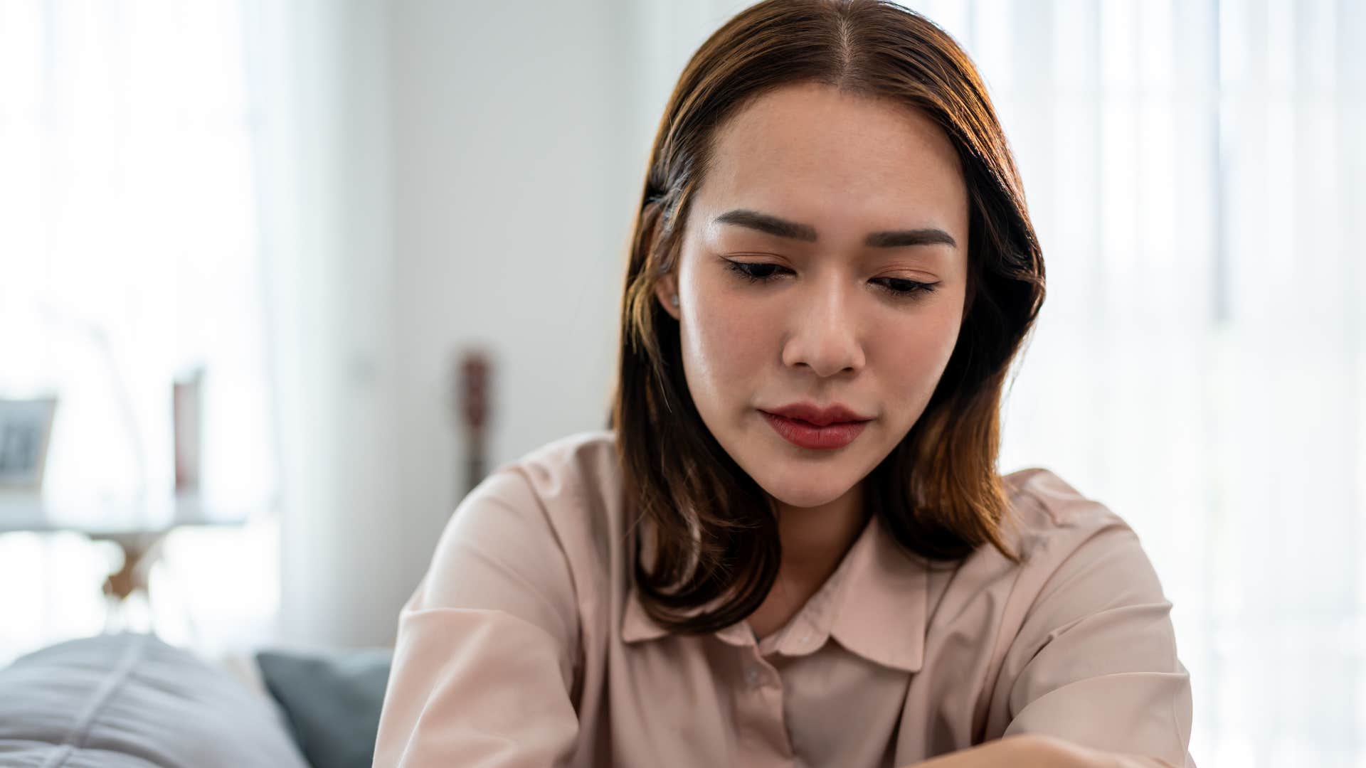woman not engaging in social interactions and events 