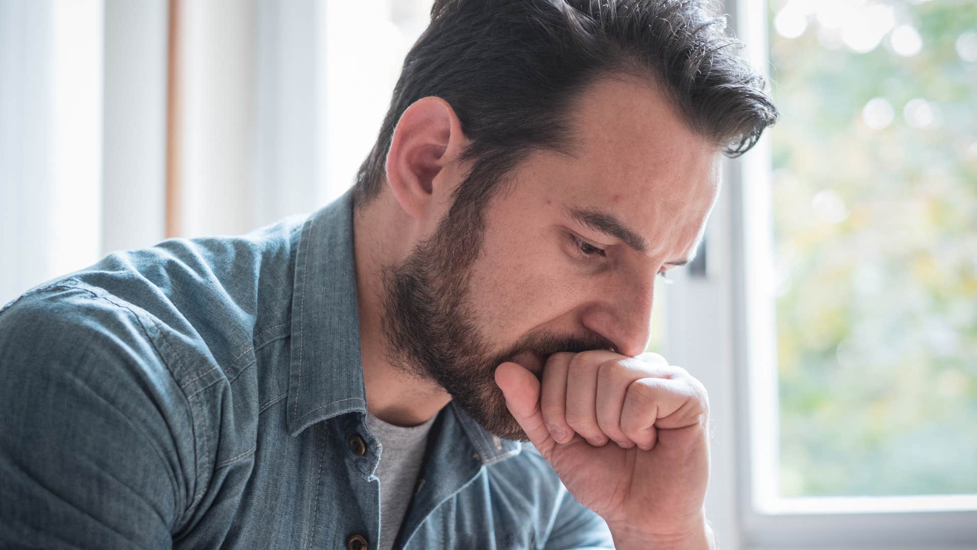 man feeling guilty about resting at home