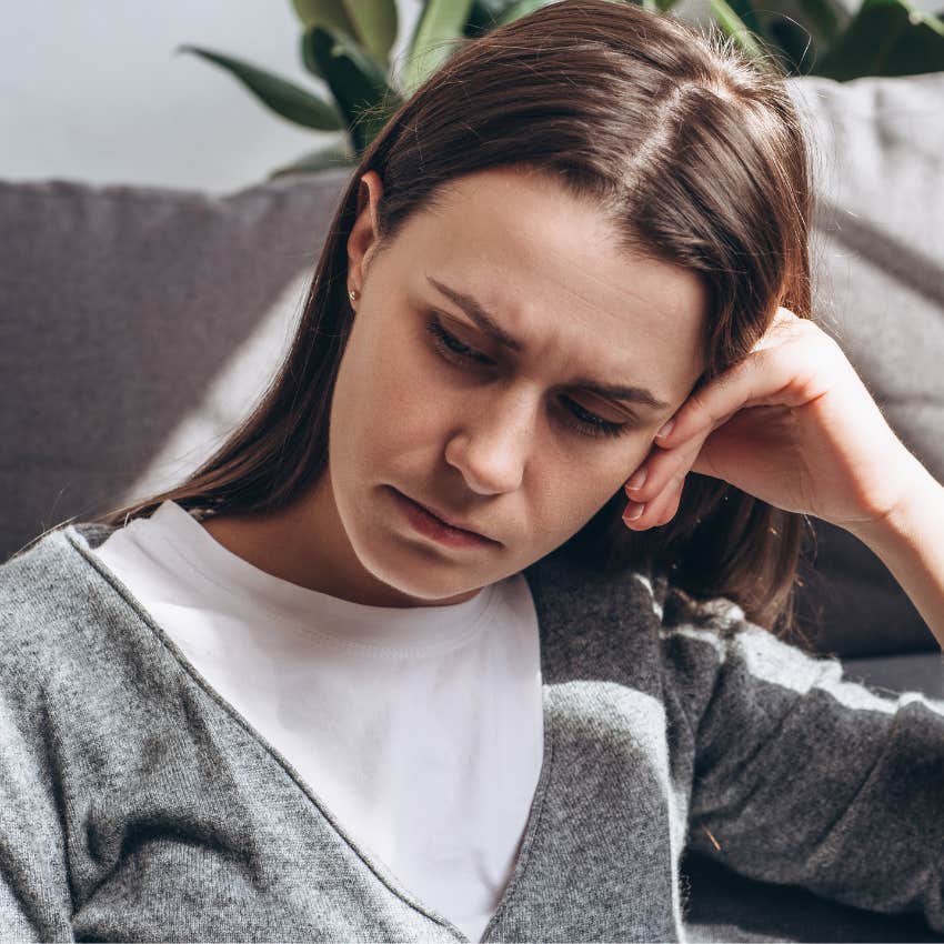 sad woman avoiding quality time entirely with partner