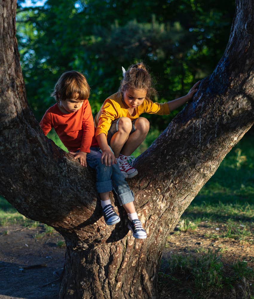 kids climbing tree show simple joy and kindness in a chaotic world