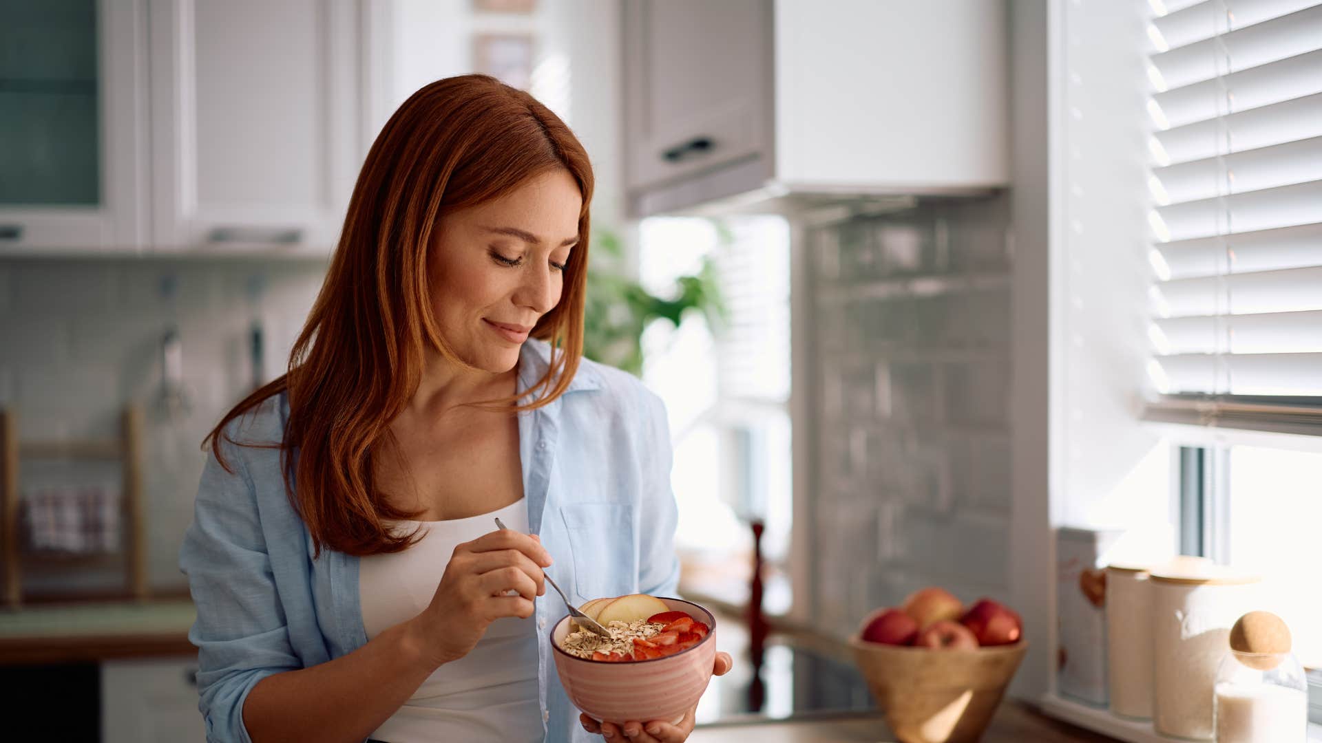 woman eating breakfast alone