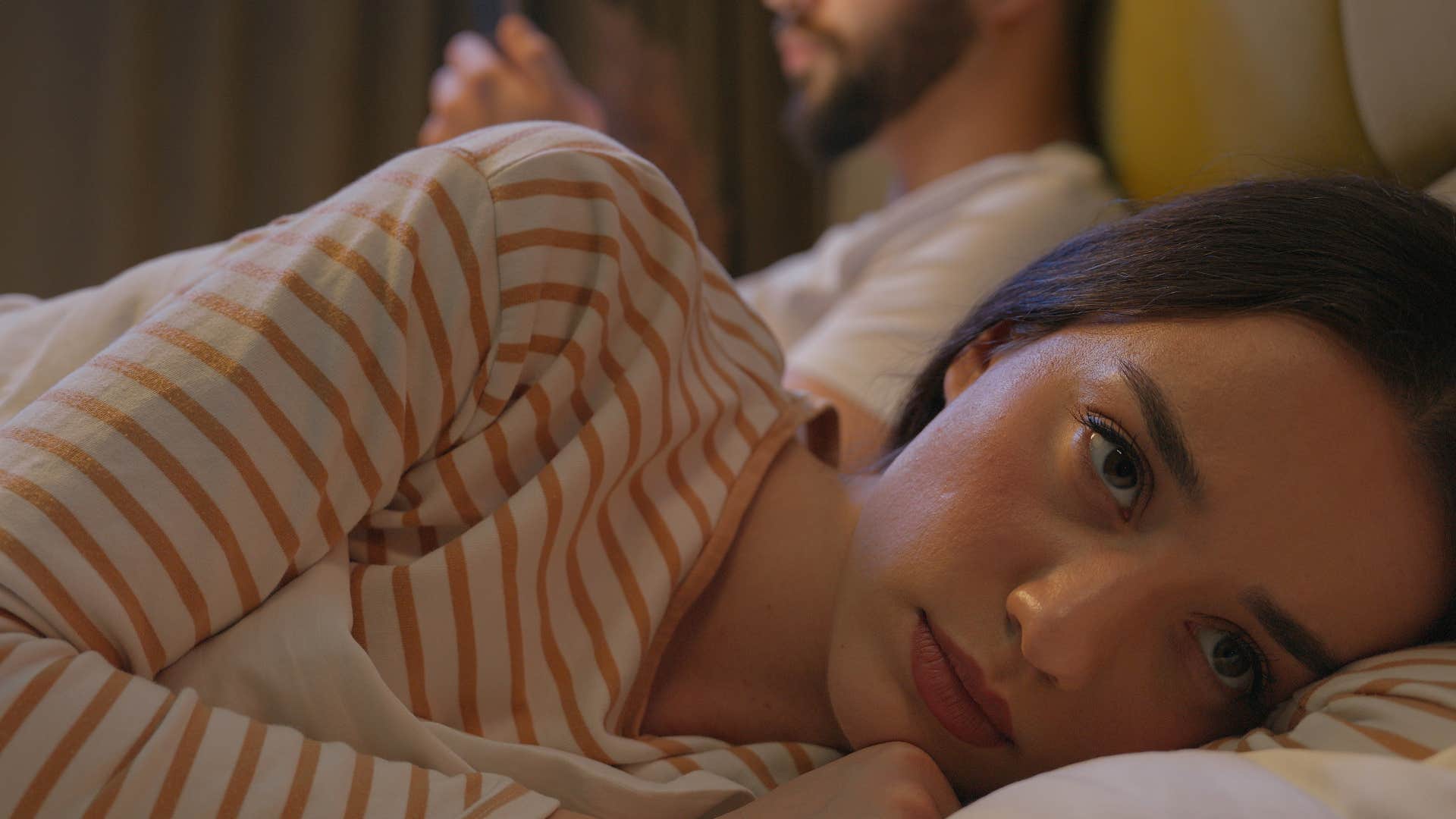 woman rarely showing affection ignoring husband