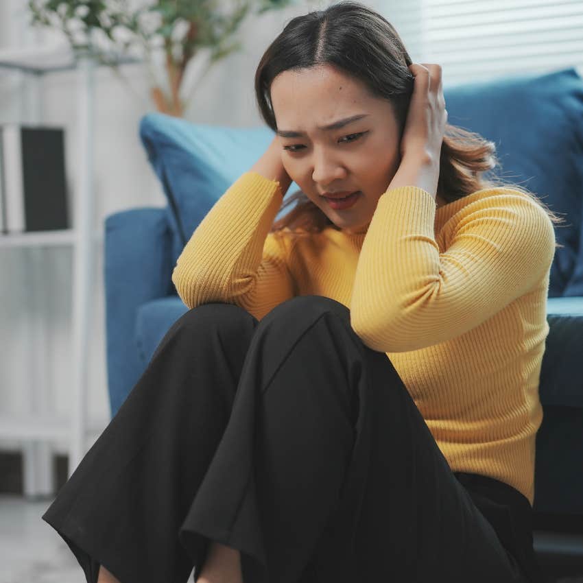 woman worried about losing control stressing out
