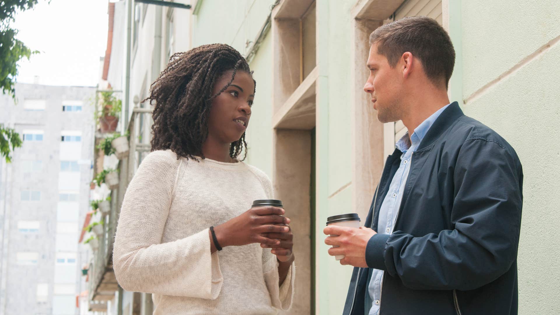 couple having a serious conversation with coffee