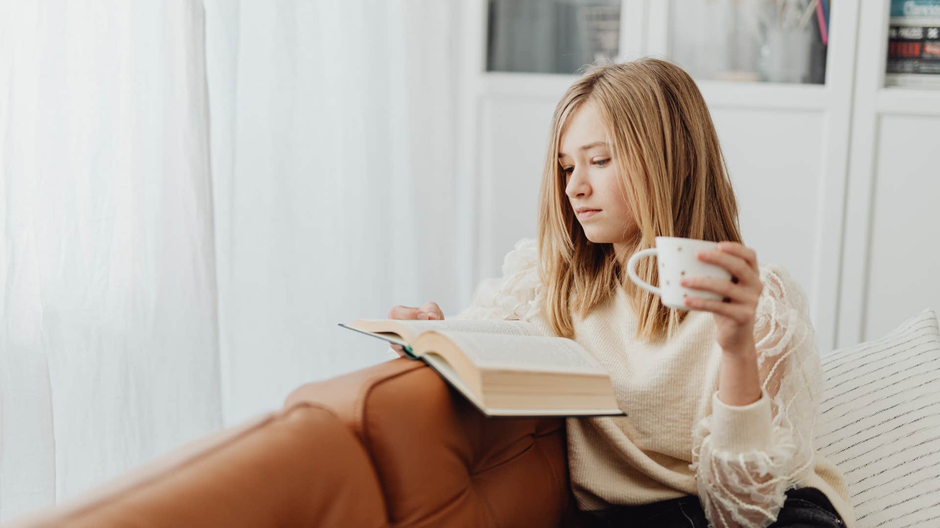 successful woman reading a book