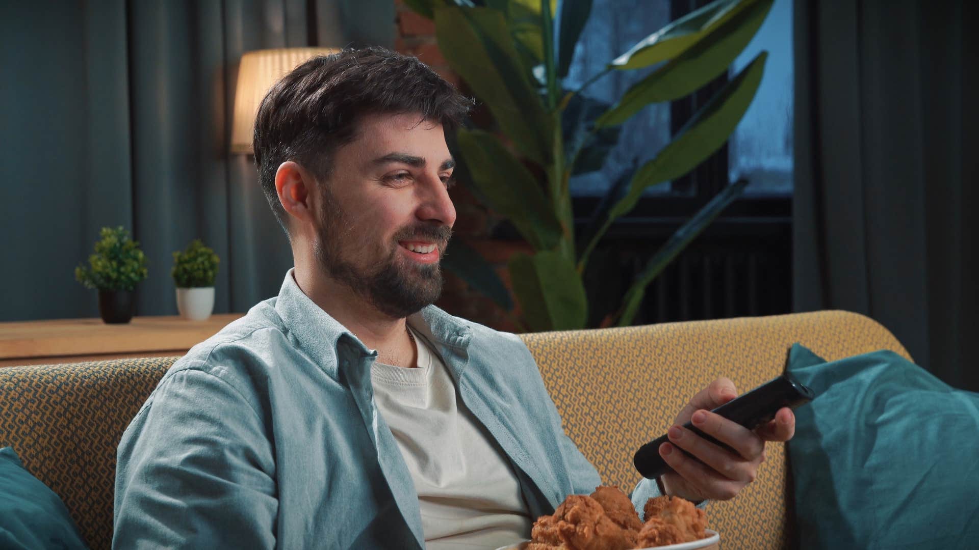 man watching tv bonding with fictional father figures