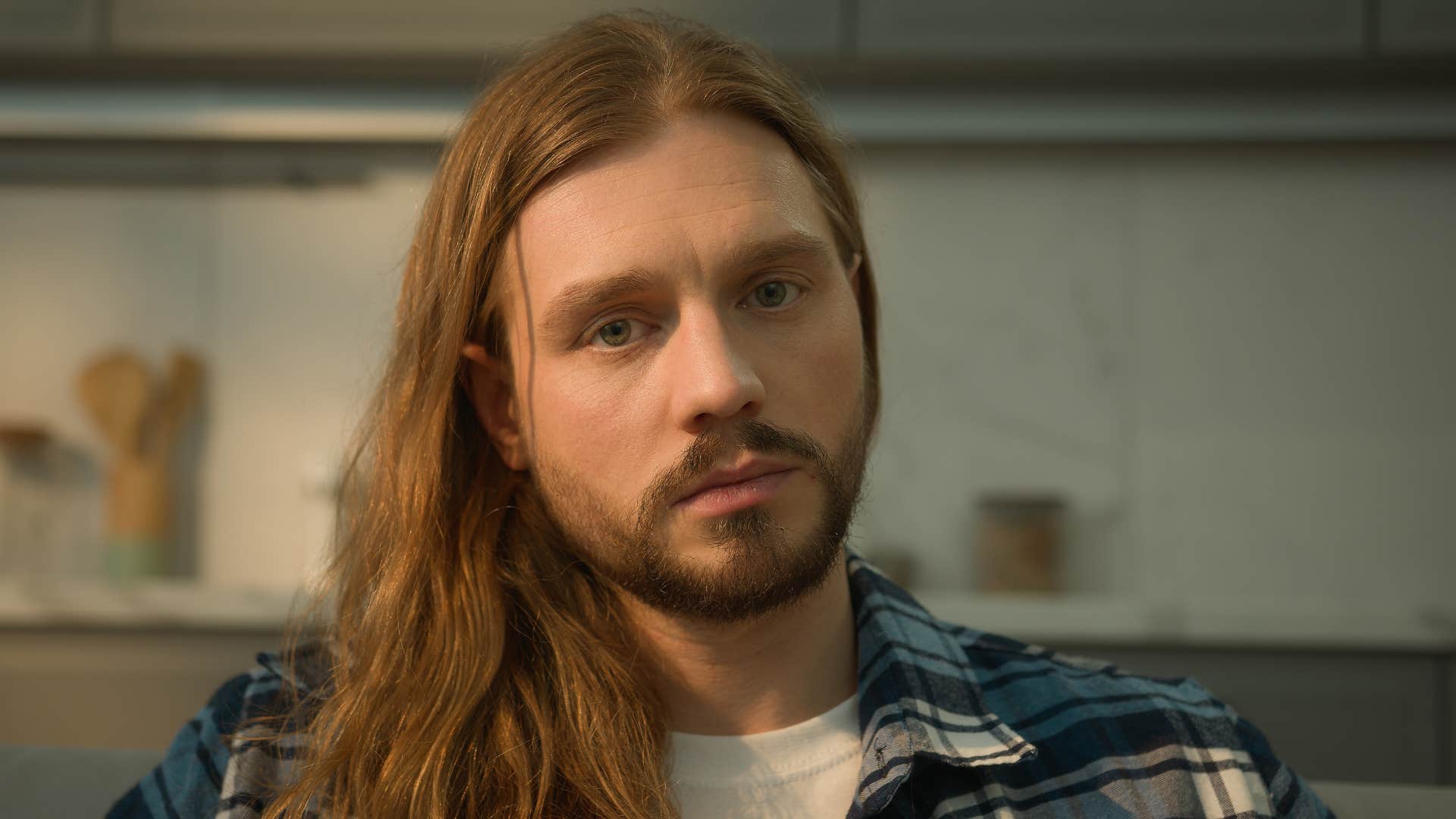 man who grew up with absent father looking sad