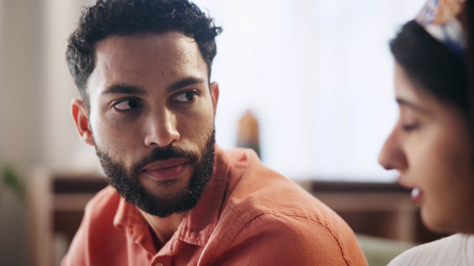 man telling annoyed wife he's forgetful