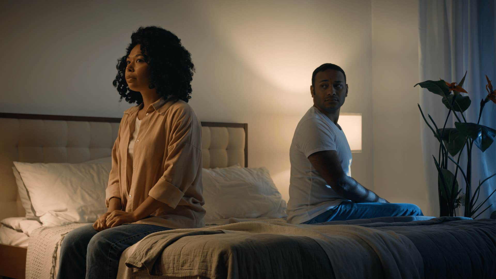 couple in bed lacking intimacy