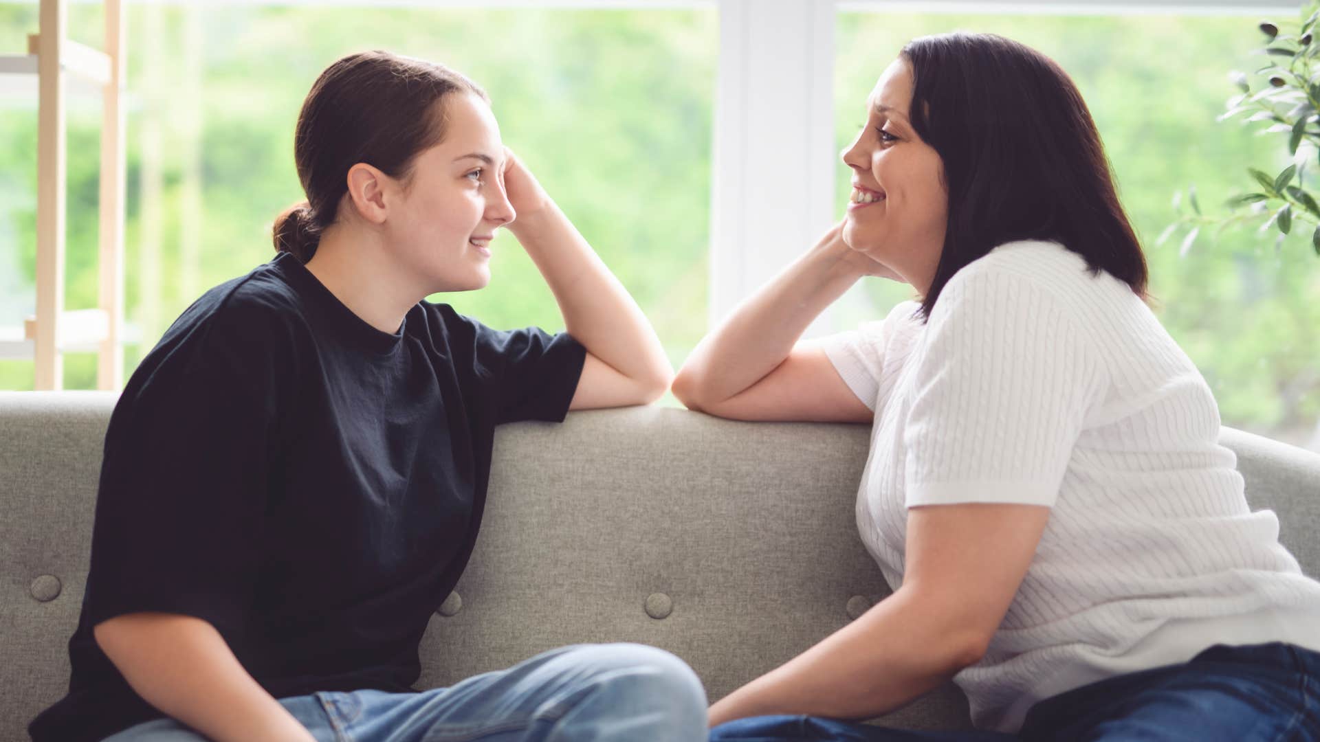 woman telling friend she's just a little tired