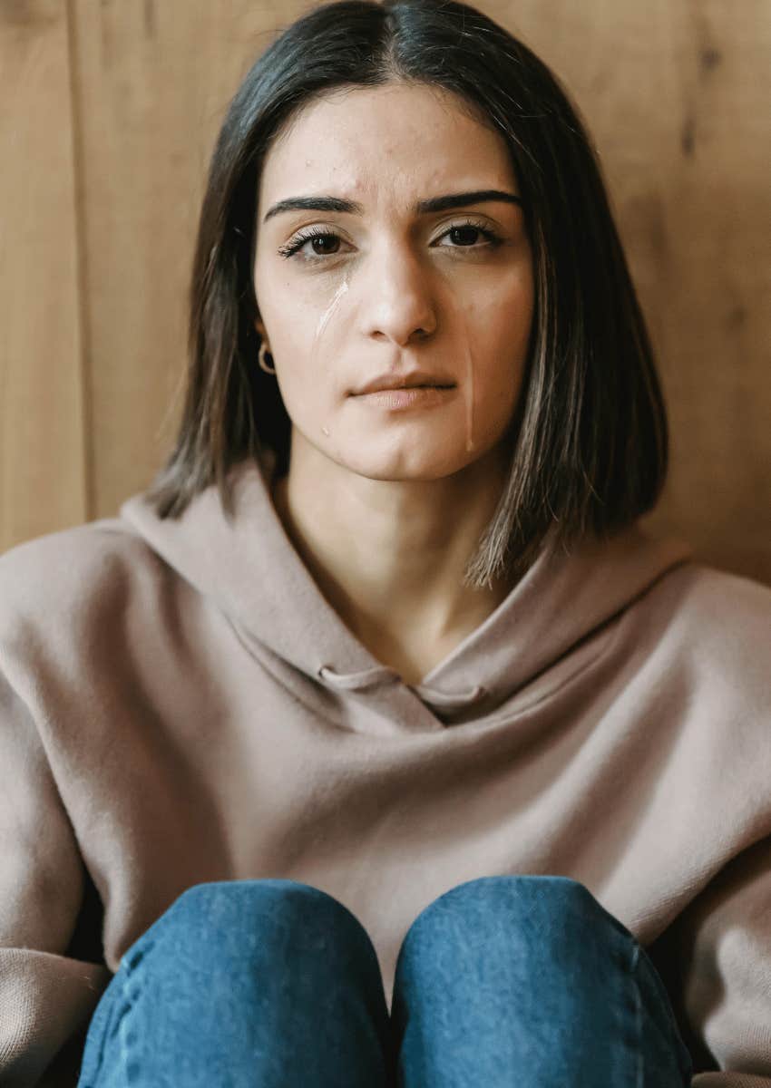 young woman crying after breakup