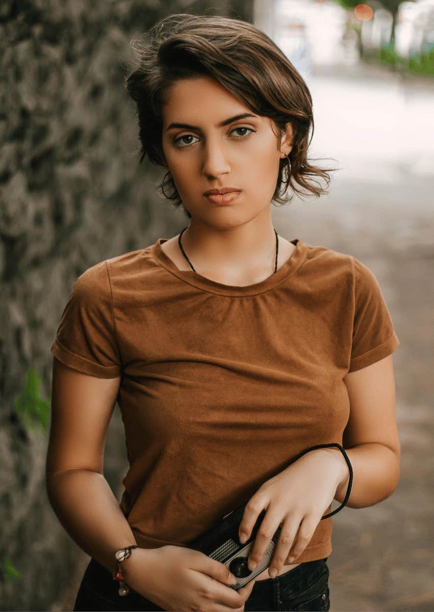 serious young woman trying to keep her story straight