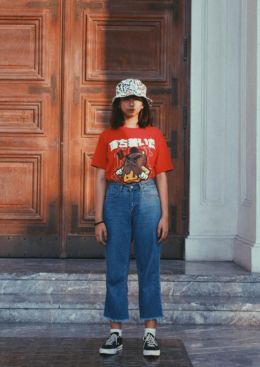 young woman wearing a bucket hat