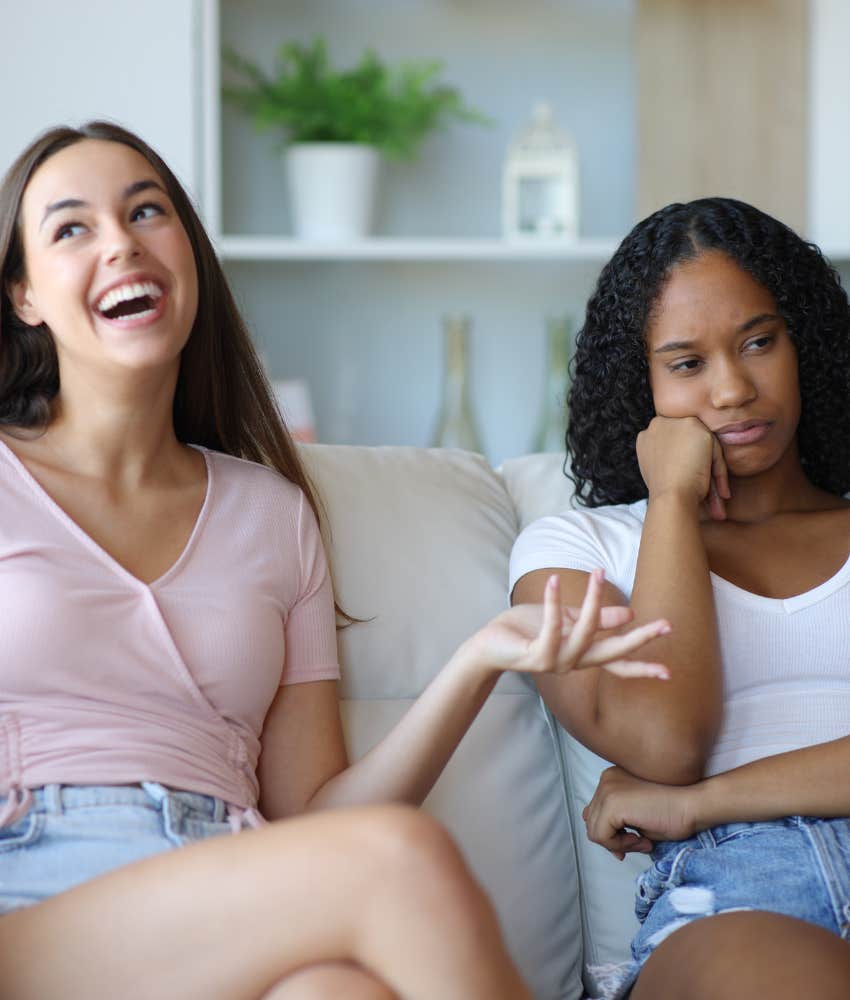 Annoyed woman listens to friends greeting card advice
