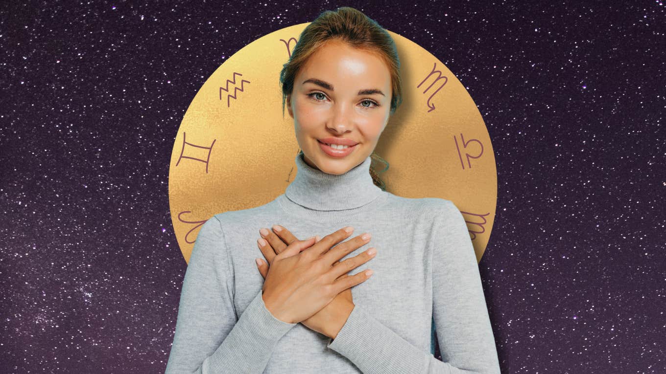 Woman holding her hands to her heart in front of zodiac symbols, representing three zodiac signs ending loneliness after December 4, 2025