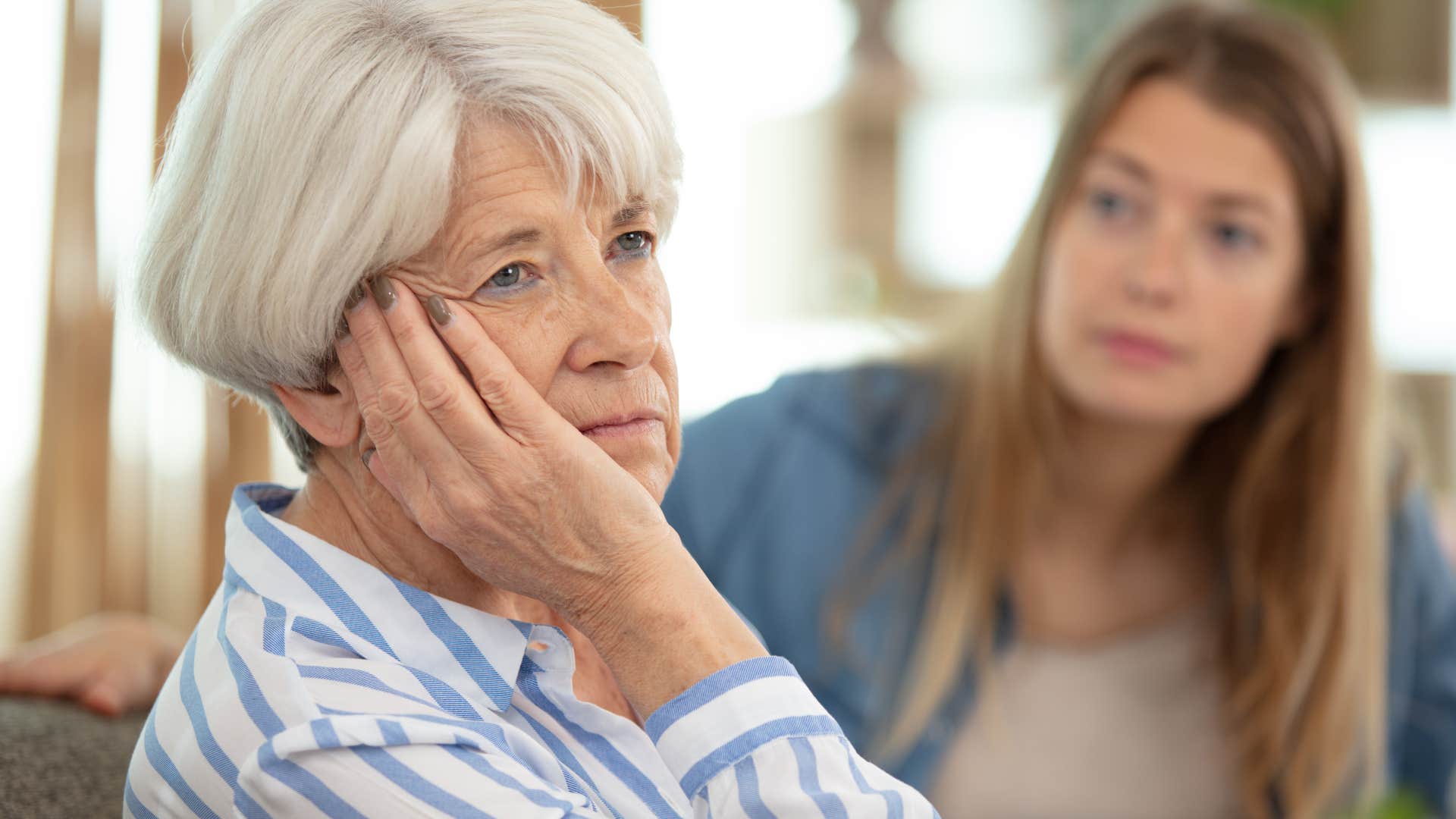 woman minimizing her older mother's emotions