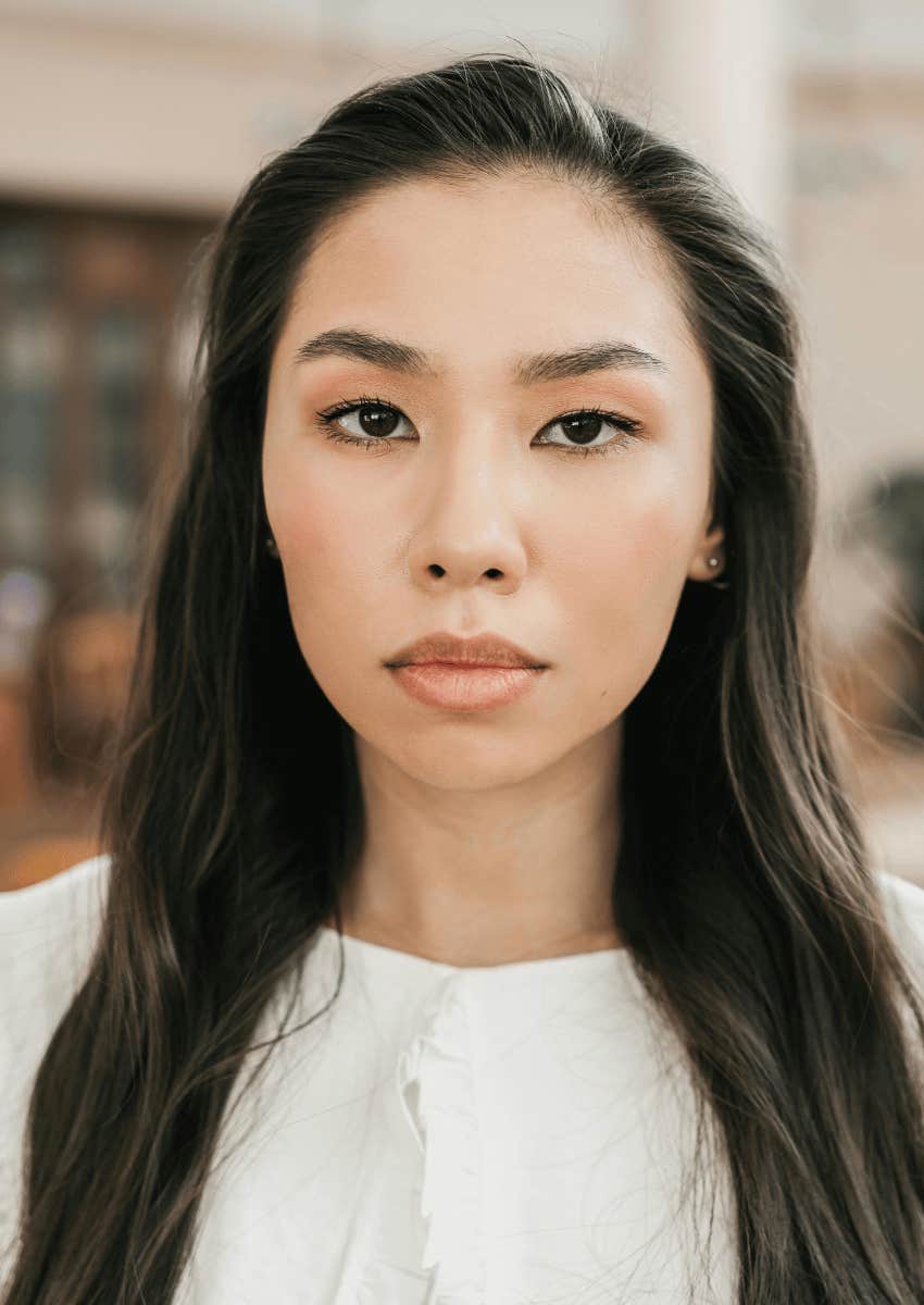 adult woman with a serious expression